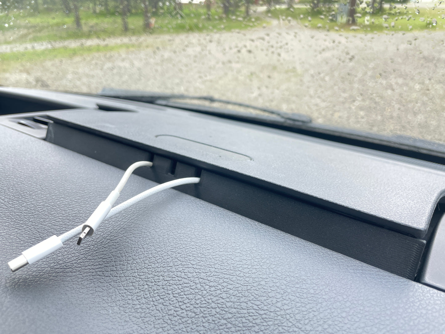 Cable pass-through for the Mercedes Sprinter 2019+ windshield storage compartment