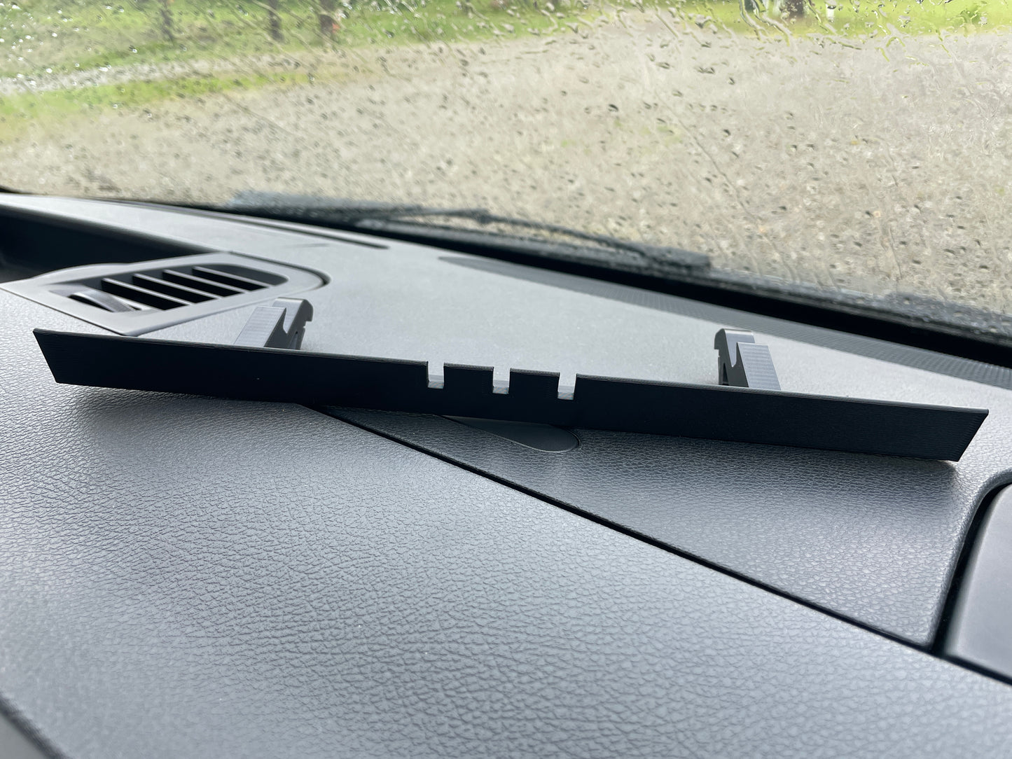 Cable pass-through for the Mercedes Sprinter 2019+ windshield storage compartment